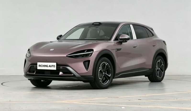 2025 Xiaomi YU7 Ultra-Long Range RWD Edition orange electric SUV front three quarter view