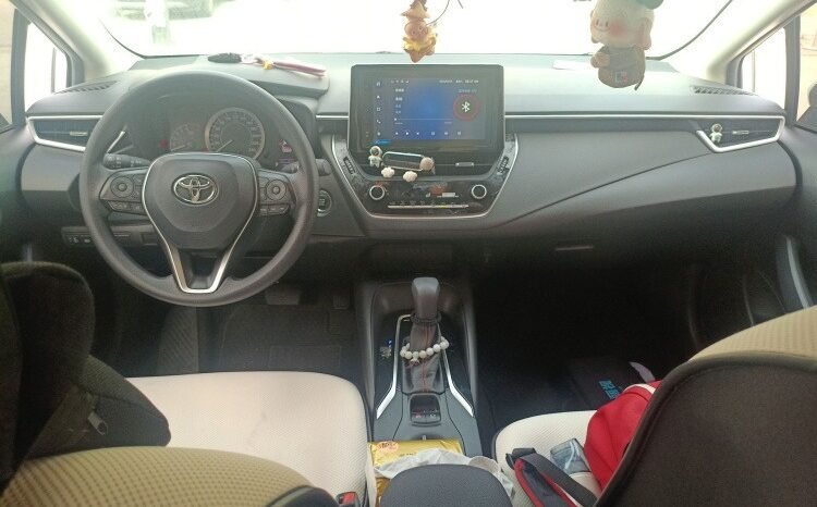 
								Toyota Corolla 2021 1.2T Elite PLUS Edition – White Sedan full									
