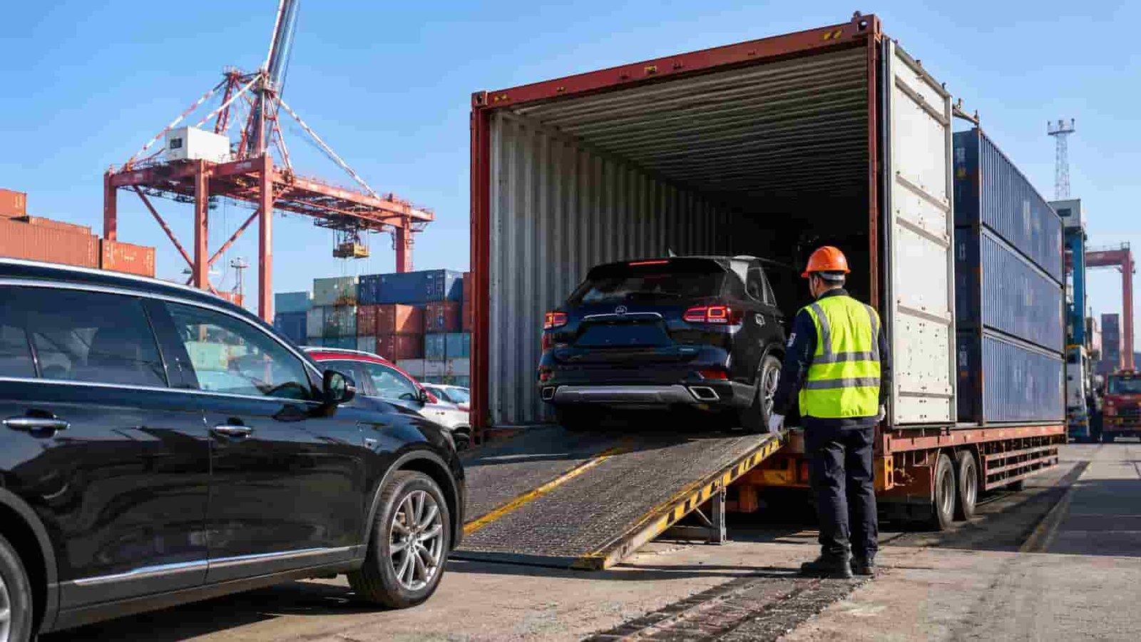 Cars being loaded into a 40ft shipping container at Nansha Port Guangzhou for export