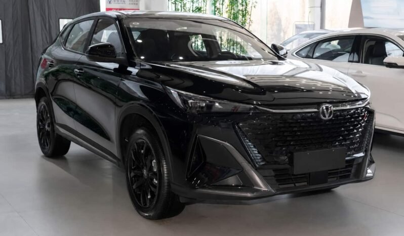 Black 2025 Changan X5 PLUS 1.5T DCT High Energy Edition shown from front three quarter view in showroom