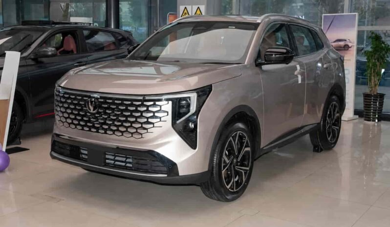 Champagne silver 2026 Changan CS55 PLUS Fourth Generation New Blue Core 1.5T Tianshu Luxury shown from front three quarter angle in showroom