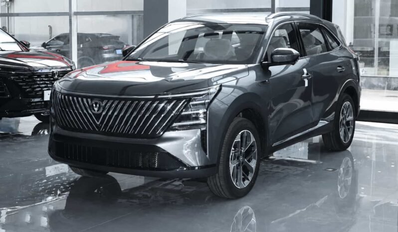 Gray 2026 Changan CS75 PLUS 1.5T Flagship SUV shown from front three quarter view in showroom