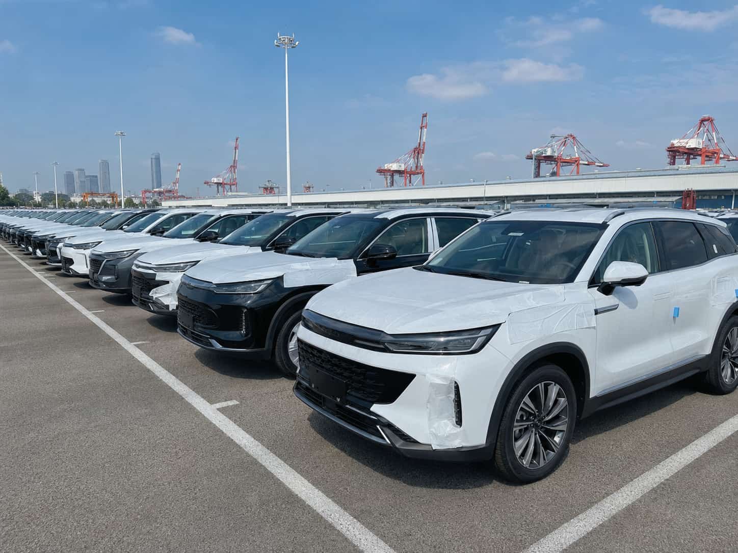 Brand new Chinese SUVs with zero mileage at a Guangzhou factory export yard ready for overseas delivery