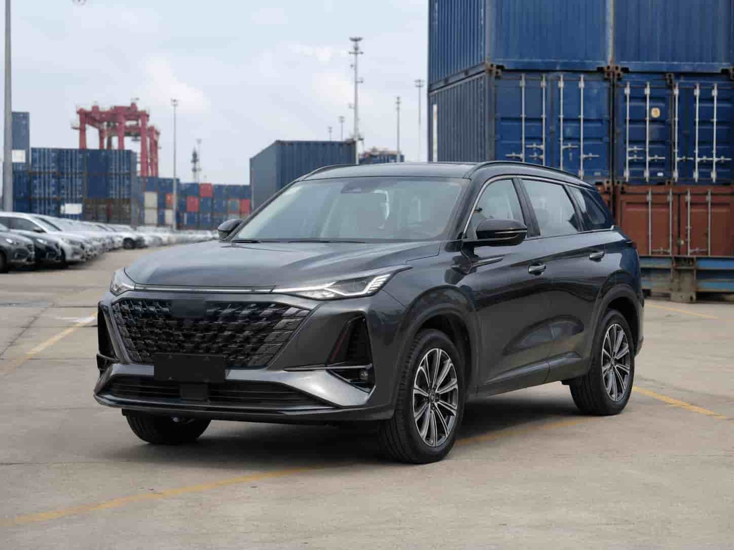Changan CS75 Plus mid-size SUV parked at a Guangzhou vehicle export yard ready for container loading to Africa