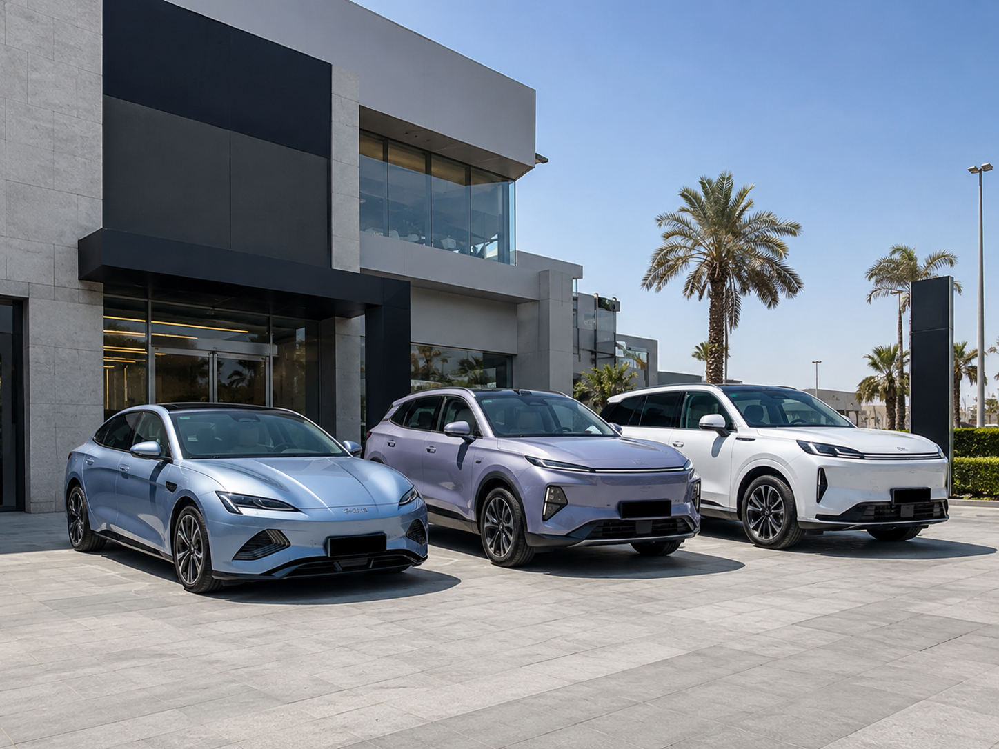 BYD and Geely electric vehicles lined up at a UAE dealer lot after successful import from China