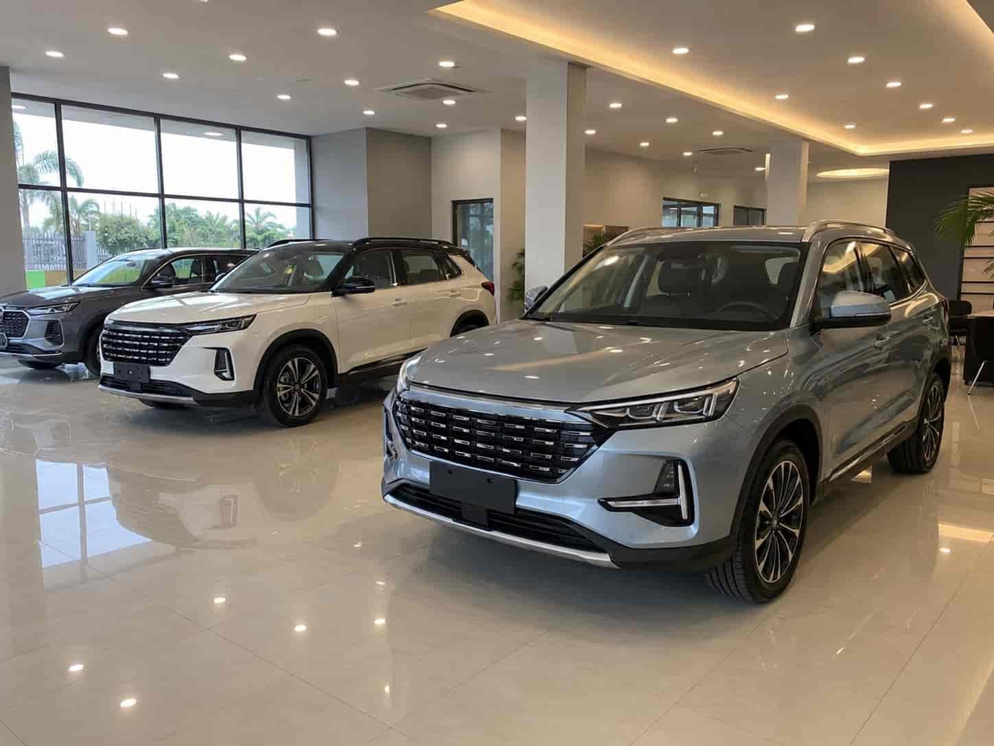 Chinese SUVs including Changan CS55 and Jetour X70 displayed at an Accra Ghana car dealer showroom