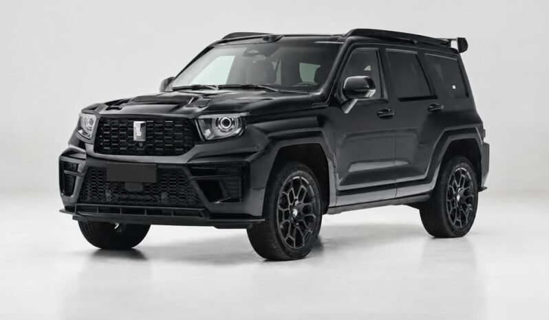 Front three-quarter view of TANK 700 Hi4-T black luxury off-road SUV showing large front grille, round LED headlights, rugged bumper, alloy wheels and white studio background