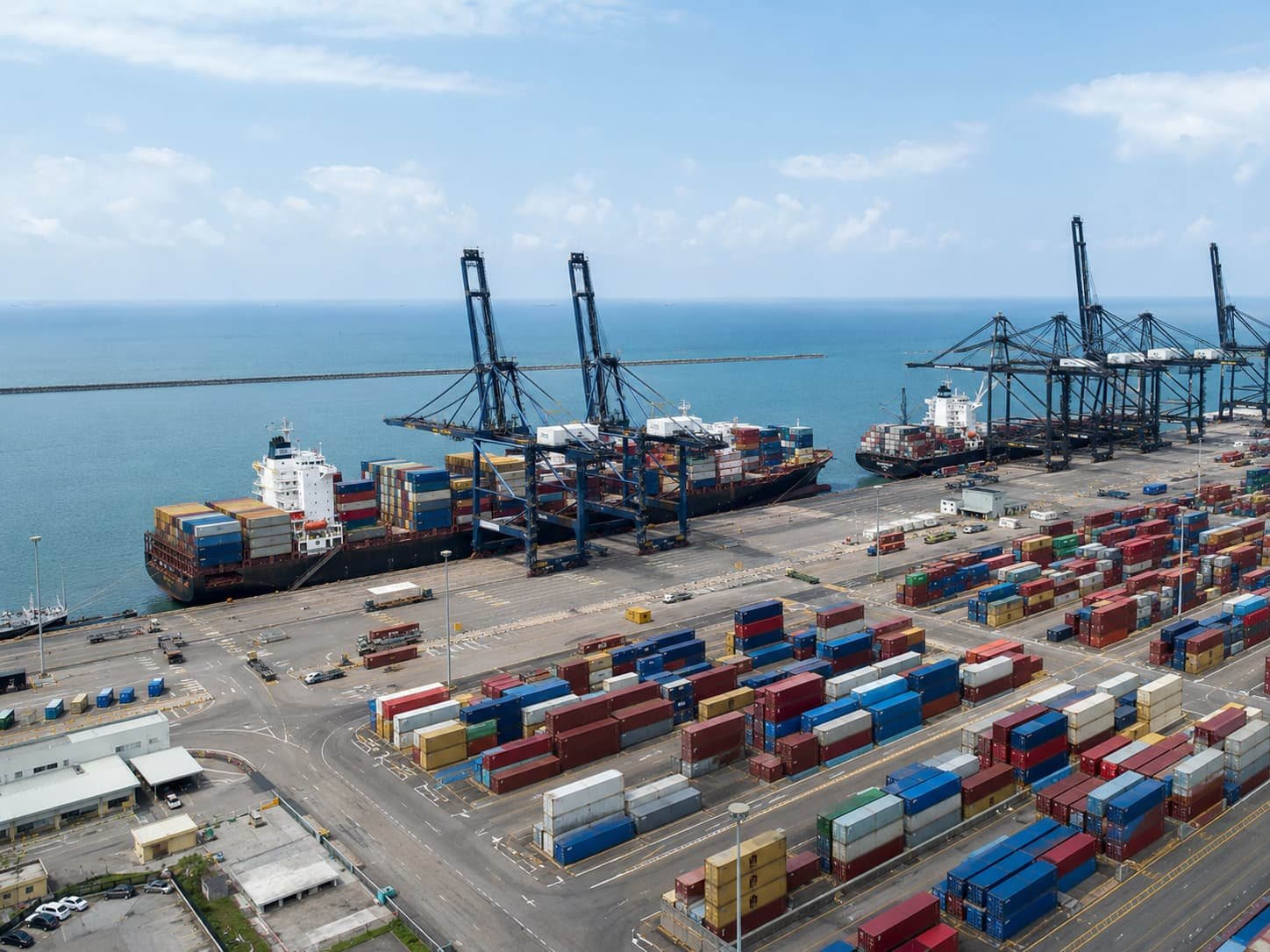 Container ships and vehicle import terminal at Tema Port Ghana for dealers importing cars from China