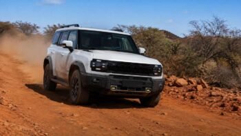 Jetour T2 SUV driving on an African dirt road demonstrating off-road capability for dealers